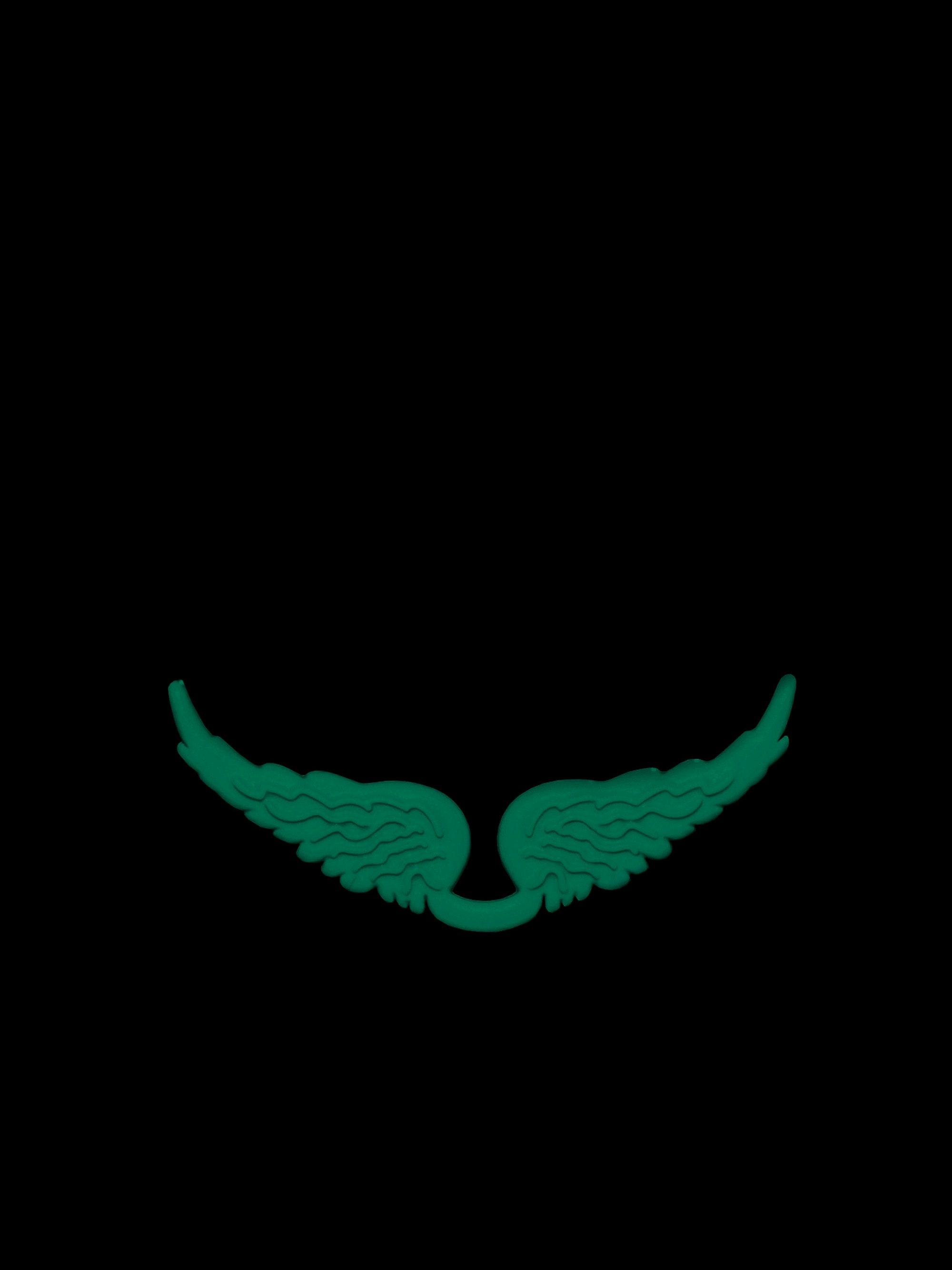 Charm Swing Your Wings Phosphorescent - Charm ailes à clipser sur un sac Swing your Wings, conçu pour personnaliser exclusivement cette gamme de sacs.